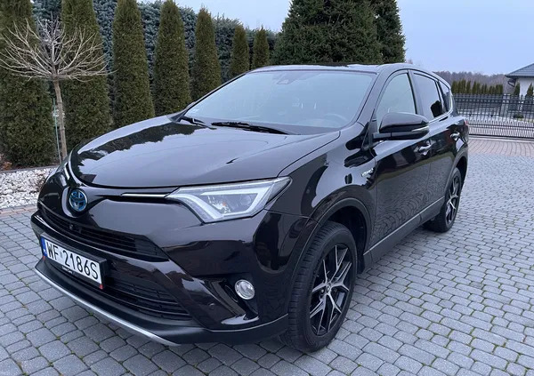 mazowieckie Toyota RAV4 cena 119900 przebieg: 84000, rok produkcji 2018 z Głogów